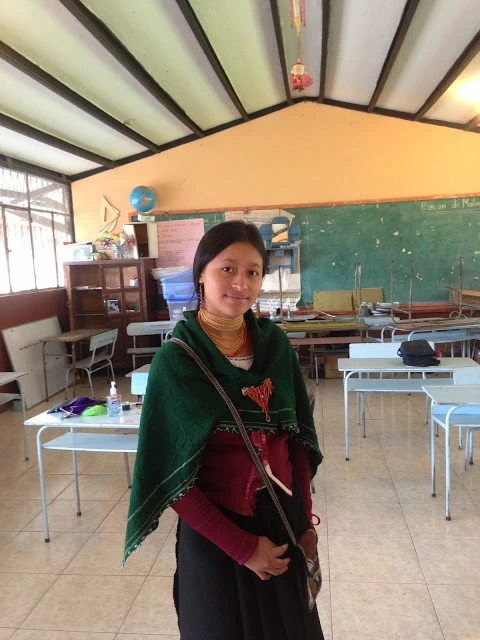 SQ fav young Salasaca woman in empty classroom