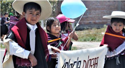 kids holding sign